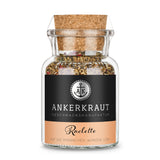 Raclette Gewürz von Ankerkraut im Korkenglas auf weißem Hintergrund.