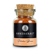 Patatas Bravas von Ankerkraut im Korkenglas auf weißem Hintergrund.