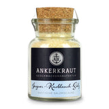 Knoblauch Ingwer Salz von Ankerkraut im Korkenglas auf weißem Hintergrund.